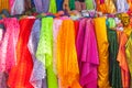 Rolls colorful of brightly coloured fabrics and cloths store