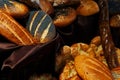 Many rolls of different breads in the bakery restaurant Royalty Free Stock Photo