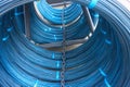 Rolls of fencing wire strapped with blue tape Royalty Free Stock Photo