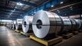 Rolls of galvanized sheet steel in the factory. Large rolls of metal coils in the warehouse.