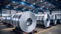 Rolls of galvanized sheet steel in the factory. Large rolls of metal coils in the warehouse.