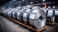 Rolls of galvanized sheet steel in the factory. Large rolls of metal coils in the warehouse.