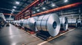 Rolls of galvanized sheet steel in the factory. Large rolls of metal coils in the warehouse.