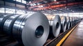 Rolls of galvanized sheet steel in the factory. Large rolls of metal coils in the warehouse.