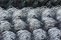 Rolls of galvanized steel wire mesh with a large cell and twisted pattern close-up. In the category of texture, screen Royalty Free Stock Photo