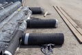 Rolls of geogrid for reinforcement the roadbed. Royalty Free Stock Photo