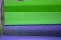 Rolls of glittered colorful Eva foam sheets, colored cardboard, rubber pad, sponge papers for school arts and crafts, pile of