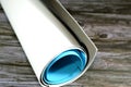 Rolls of glittered colorful Eva foam sheets, colored cardboard, rubber pad, sponge papers for school arts and crafts, pile of
