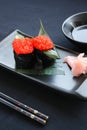 Rolls of Ikura gunkan maki sushi.