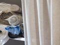 Rolls of linen on the shelf of the fabric store Royalty Free Stock Photo
