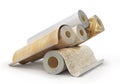 Rolls of linoleum with different texture on a white Royalty Free Stock Photo