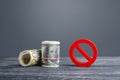 Rolls of money euros dollars and red prohibition symbol NO. Capital export outflow restrictions. Sanctions. Regulatory laws Royalty Free Stock Photo