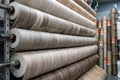 Rolls of new linoleum on the window of a hardware store. Royalty Free Stock Photo