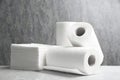 Rolls of paper towels and napkins on marble table Royalty Free Stock Photo