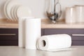 Rolls of paper towels on table Royalty Free Stock Photo