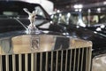 Rolls Royce Logo on black car close up a luxury classic United Kingdom brand
