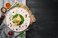 Rolls with salmon and spinach. Lavash. In the plate. Top view.