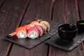 Rolls set with fish salmon and shrimp and tuna maguro eel sushi with chopsticks - asian food and japanese cuisine Royalty Free Stock Photo