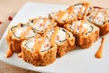 Rolls with shrimps, cream cheese, tomatoes and Spicy sauce in white plate top view Royalty Free Stock Photo