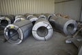 Rolls of steel sheet stored in warehouse; galvanized steel coil in the Duct Factory. Packed rolls of steel sheet, Cold rolled stee Royalty Free Stock Photo