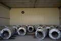 Rolls of steel sheet stored in warehouse; galvanized steel coil in the Duct Factory. Packed rolls of steel sheet, Cold rolled stee Royalty Free Stock Photo