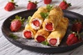 Rolls with strawberry and cream cheese close-up. Horizontal Royalty Free Stock Photo