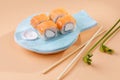 rolls and sushi on a plate in the form of fish Royalty Free Stock Photo