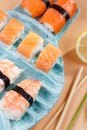 Rolls and sushi on a plate in the form of fish Royalty Free Stock Photo