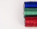 Rolls of thread with RGB colors. Royalty Free Stock Photo