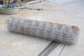 Rolls of wire mesh steel for put a pile on the ground. Steel reinforced rod for concrete construction Royalty Free Stock Photo