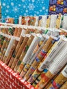Rolls of wrapping paper for Christmas gifts are sold in the store