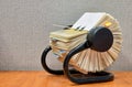 Rolodex file organizer sitting open on an office desk. Royalty Free Stock Photo