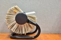 Rolodex file organizer sitting open on an office desk.