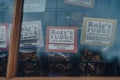 Rolys fudge on display in shop window in Cotswolds, UK