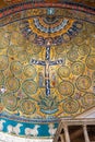 Close-up on golden religious mosaic decorating the dome ceiling of Saint Clemens Basilica in Italy Royalty Free Stock Photo