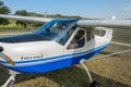ROMA, ITALY - AUGUST 2018: Female instructor and little girl child at the helm of a light aircraft Tecnam P92 Echo