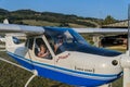 ROMA, ITALY - AUGUST 2018: Female instructor and little girl child at the helm of a light aircraft Tecnam P92-S Echo