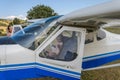 ROMA, ITALY - AUGUST 2018: Female instructor and little girl child of a light aircraft