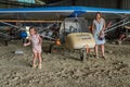 ROMA, ITALY - AUGUST 2018: Female instructor and little girl child of a light aircraft