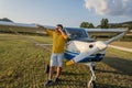 ROMA, ITALY - AUGUST 2018: Young pilot near his plane Tecnam P92-S Echo