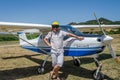 ROMA, ITALY - JULY 2017: Courageous young man pilot on a light aircraft Tecnam P92-S Echo