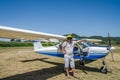 ROMA, ITALY - JULY 2017: Courageous young man pilot on a light aircraft Tecnam P92-S Echo