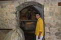 ROMA, ITALY - JULY 2019: Male pilgrim near the icon in Greccio where St. Francis of Assisi held the first nativity scene