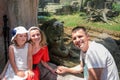 ROMA, ITALY - JULY 2019: Tourists near the aviary with a lion at the zoo