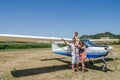 ROMA, ITALY - JULY 2017: A young family father, mother and daughter in the cabin of a light aircraft Tecnam P92-S Echo