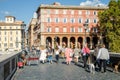 Roma, Italy - October 2015: Tourists walk over bridges and streets of ancient Rome on a sunny autumn day