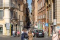 Roma, Italy - October 2015: Tourists walk over bridges and streets of ancient Rome on a sunny autumn day