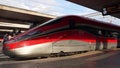 Roma, Italy. Termini train station. Train stopped at the platform waiting for passengers. High speed train Freccia Rossa 1000