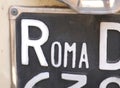 Roma on an old license plate of a car in the capital city of Ita Royalty Free Stock Photo