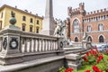 Roma square in Asti with a beautiful palace and an obelisk